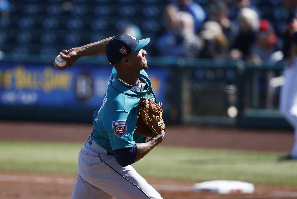 Seattle Mariners starting pitcher Ariel Miranda throws a pitch against the Cleveland Indians during the first inning of a spring training baseball game Wednesday, Feb. 28, 2018, in Goodyear, Ariz. The Indians defeated the Mariners 4-2. (AP Photo/Ross D. Franklin)