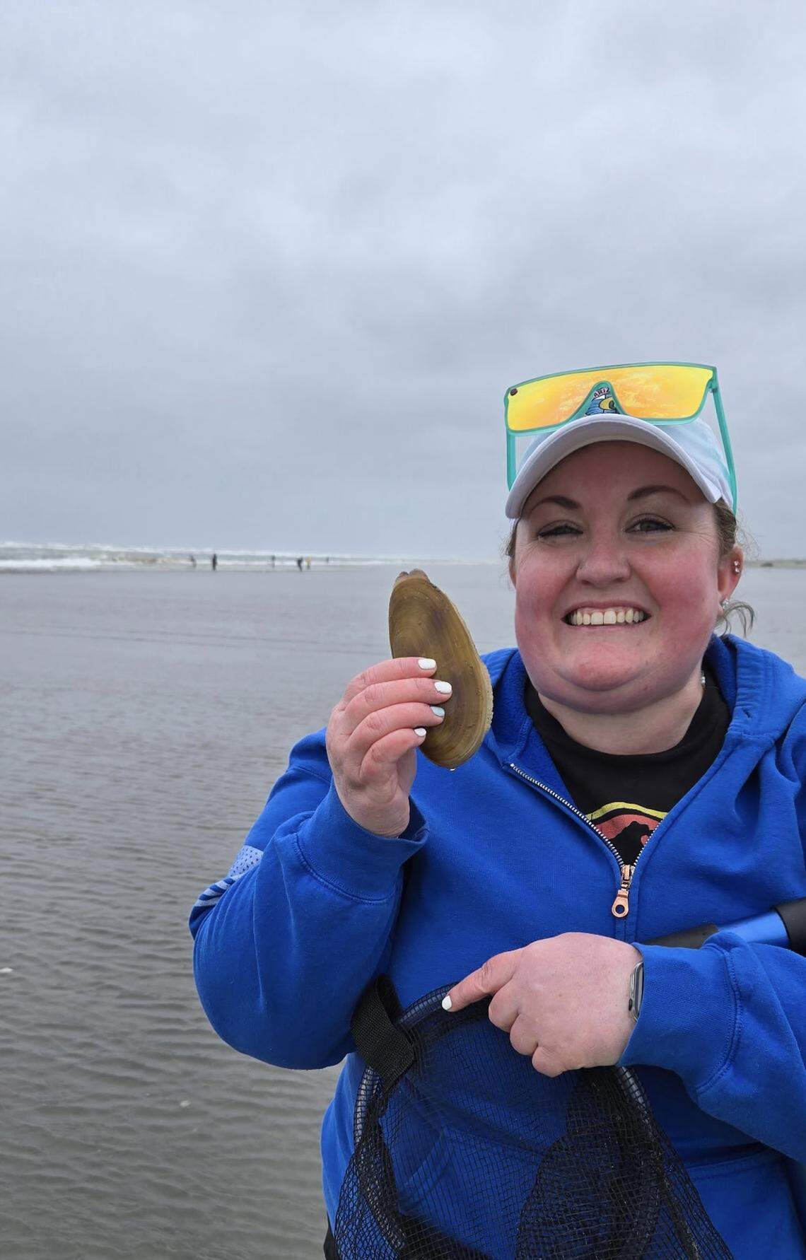 Whitney Hobbs adding to her razor clam quota last week.
