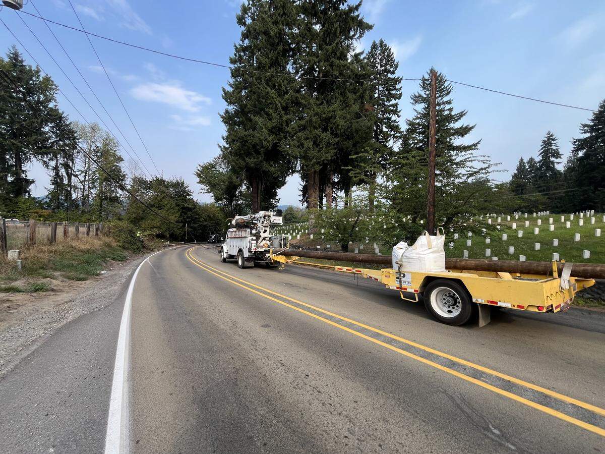The road was blocked near Washington Soldiers Home Cemetery on Orting Kapowsin Highway East after a collision took down power lines on Friday, Sept. 5, 2025 near Orting, Wash.