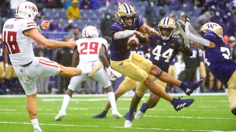 Huskies bury Arkansas State, 52-3