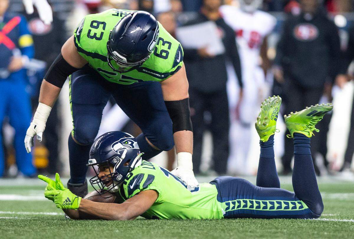 Seattle Seahawks wide receiver Tyler Lockett (16) celebrates after catching a pass in the third quarter of an NFL game against the San Francisco 49ers at Lumen Field in Seattle Wash. on Dec. 15, 2022.
