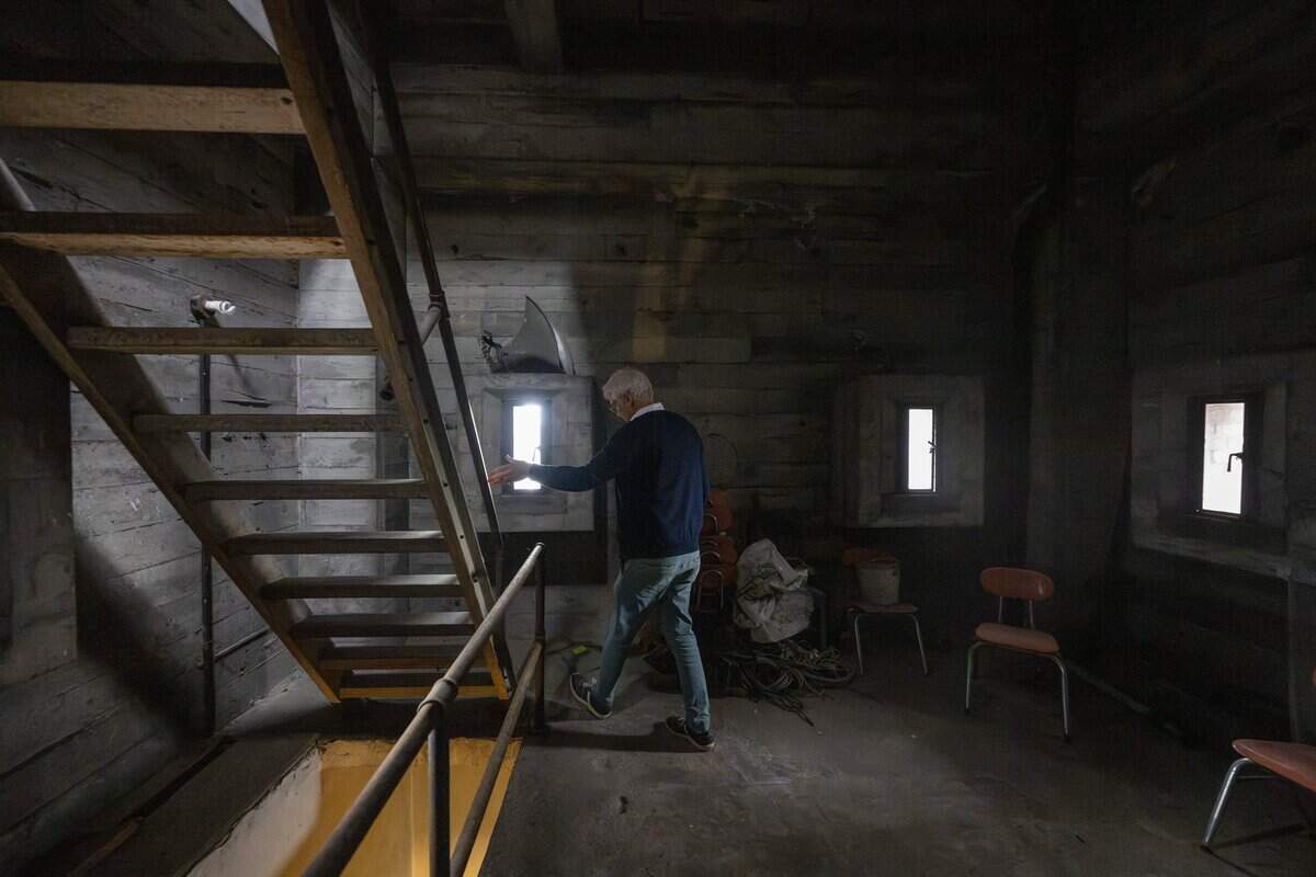 First Presbyterian Church Tacoma pastor Eric Jacobsen leads The News Tribune up several flights of stairs of the church's historic tower on Tuesday, June 30, 2026, in Tacoma, Wash.