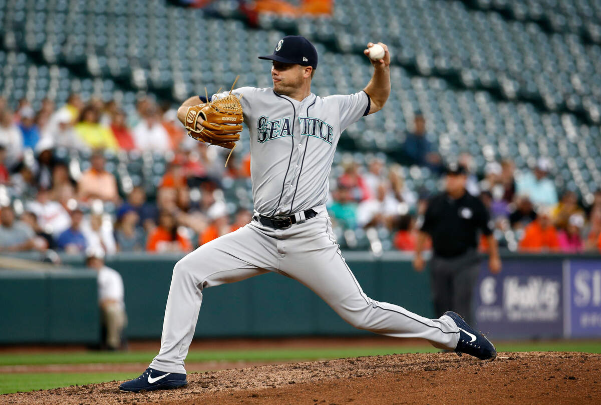 Seattle Mariners starting pitcher Wade LeBlanc throws to a Baltimore Orioles batter during the second inning of a baseball game Wednesday, June 27, 2018, in Baltimore. (AP Photo/Patrick Semansky)