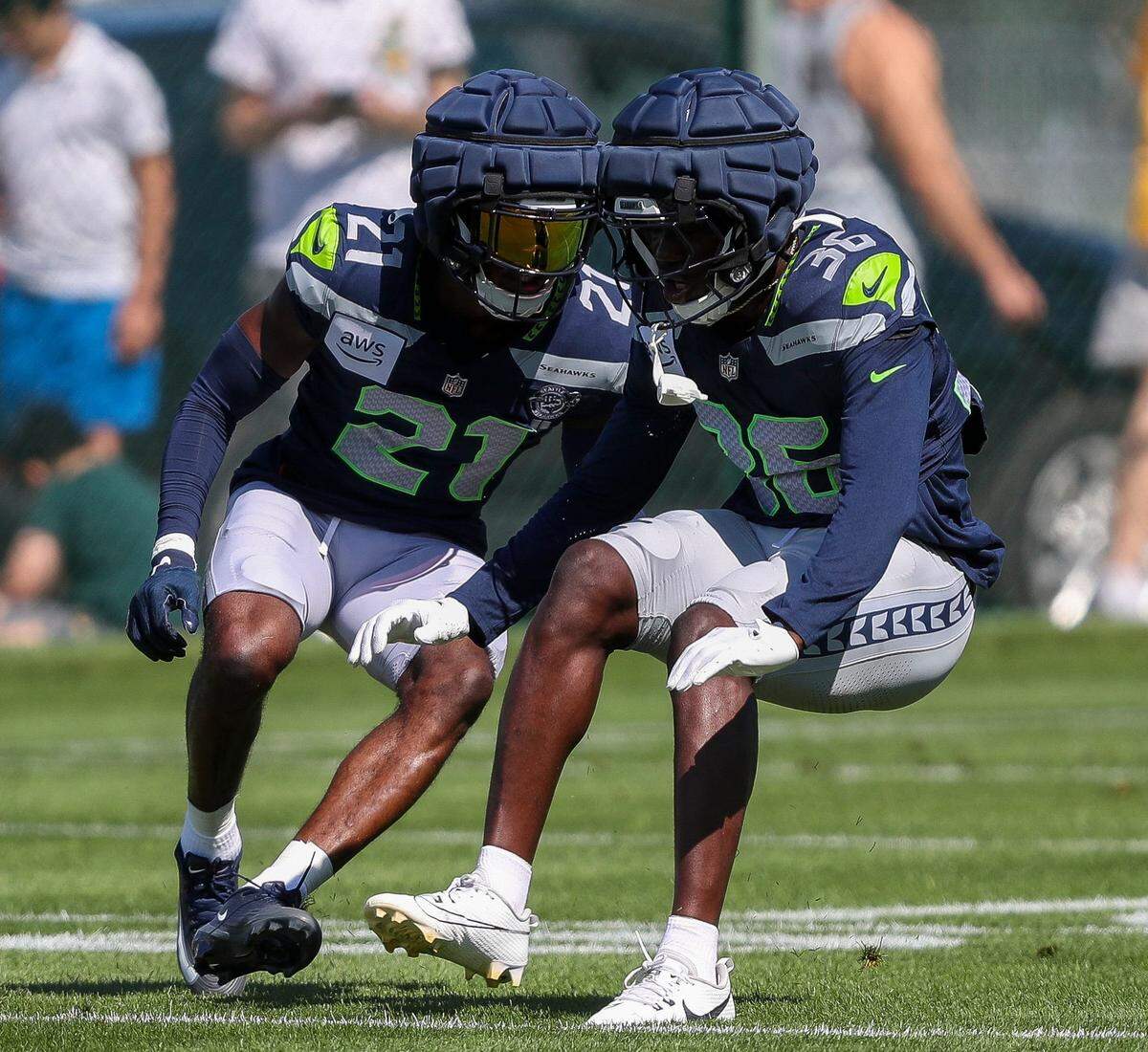 Seattle Seahawks cornerbacks Devon Witherspoon (21) and Isas Waxter (36) run through a drill during a joint practice with the Green Bay Packers on Thursday, August 21, 2025, at Clarke Hinkle Field in Ashwaubenon, Wis. Tork Mason/USA TODAY NETWORK-Wisconsin