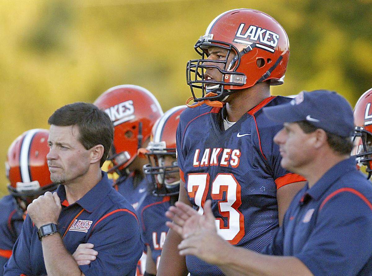 Lakes H.S. soph. Zach Banner towers over his teammates , coaches and opponents ...for a future Doug Pacey feature story Dean J. Koepfler / The News Tribune