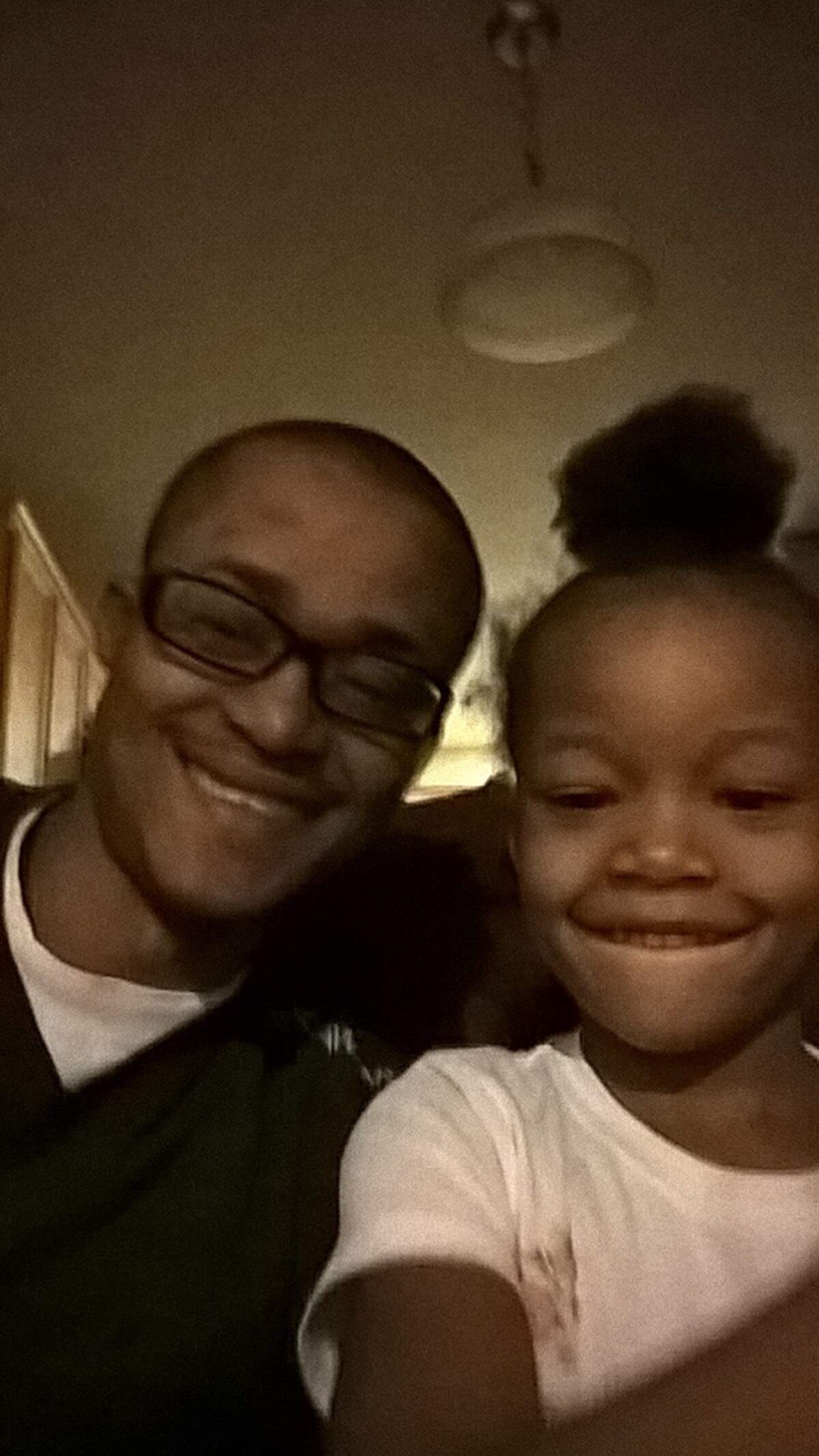 Jahleen Mitchell and his young daughter