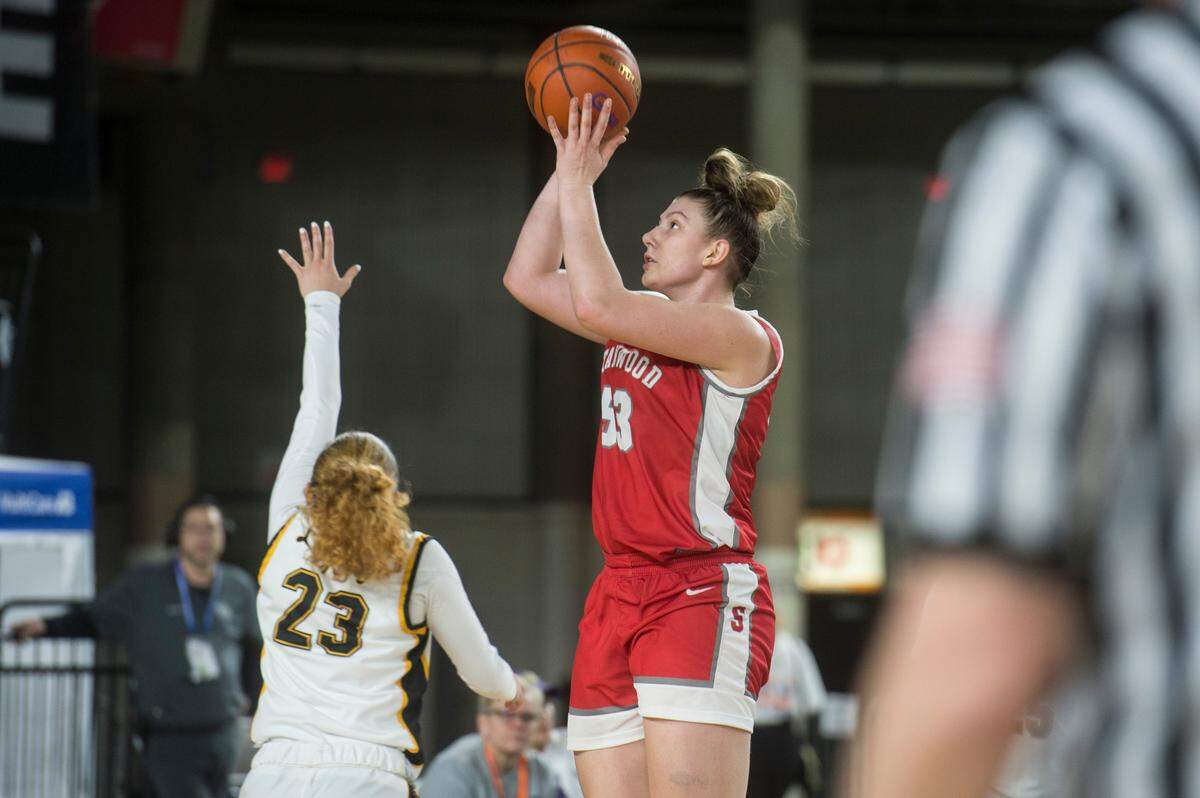 Stanwood forward Vivienne Berrett (53) puts up a shot in the fourth quarter against Lincoln in the fourth-sixth place game of the Class 3A girls state basketball tournament on Saturday, March 4, 2023 at the Tacoma Dome in Tacoma, Wash.