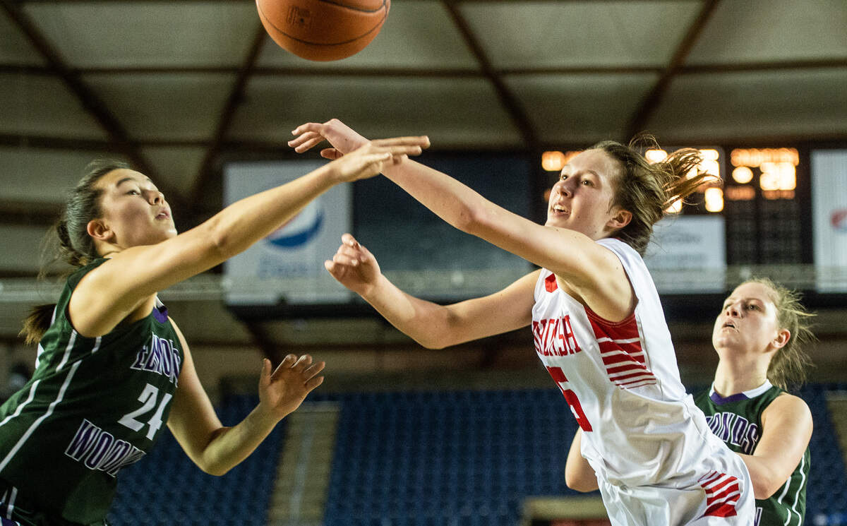 Edmonds-Woodway’s Rebekah Dasalla-Good and Snohomish’s Ella Gallatin fight for a rebound in the third quarter. Edmonds-Woodway played Snohomish in a basketball game at the Hardwood Classic State Basketball Tournament at the Tacoma Dome in Tacoma, Wash., on Friday, March 1, 2019.
