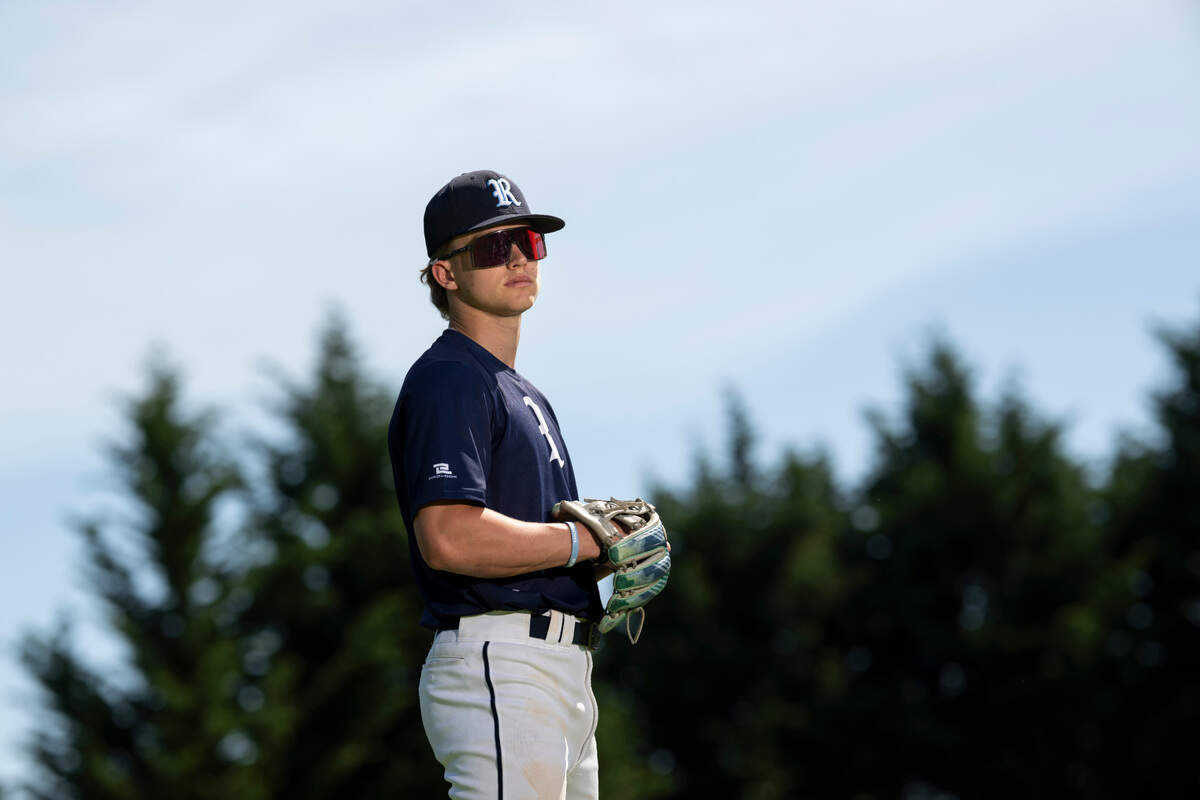 Rogers High School third baseman Ian Draper poses for a portrait at Heritage Recreation Center, on Wednesday, May 15, 2024, in Puyallup, Wash.