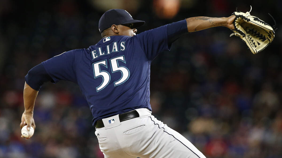 Seattle Mariners pitcher Roenis Elias (55) delivers against the Texas Rangers during the third inning of a baseball game Friday, Sept. 21, 2018, in Arlington, Texas. (AP Photo/Mike Stone)