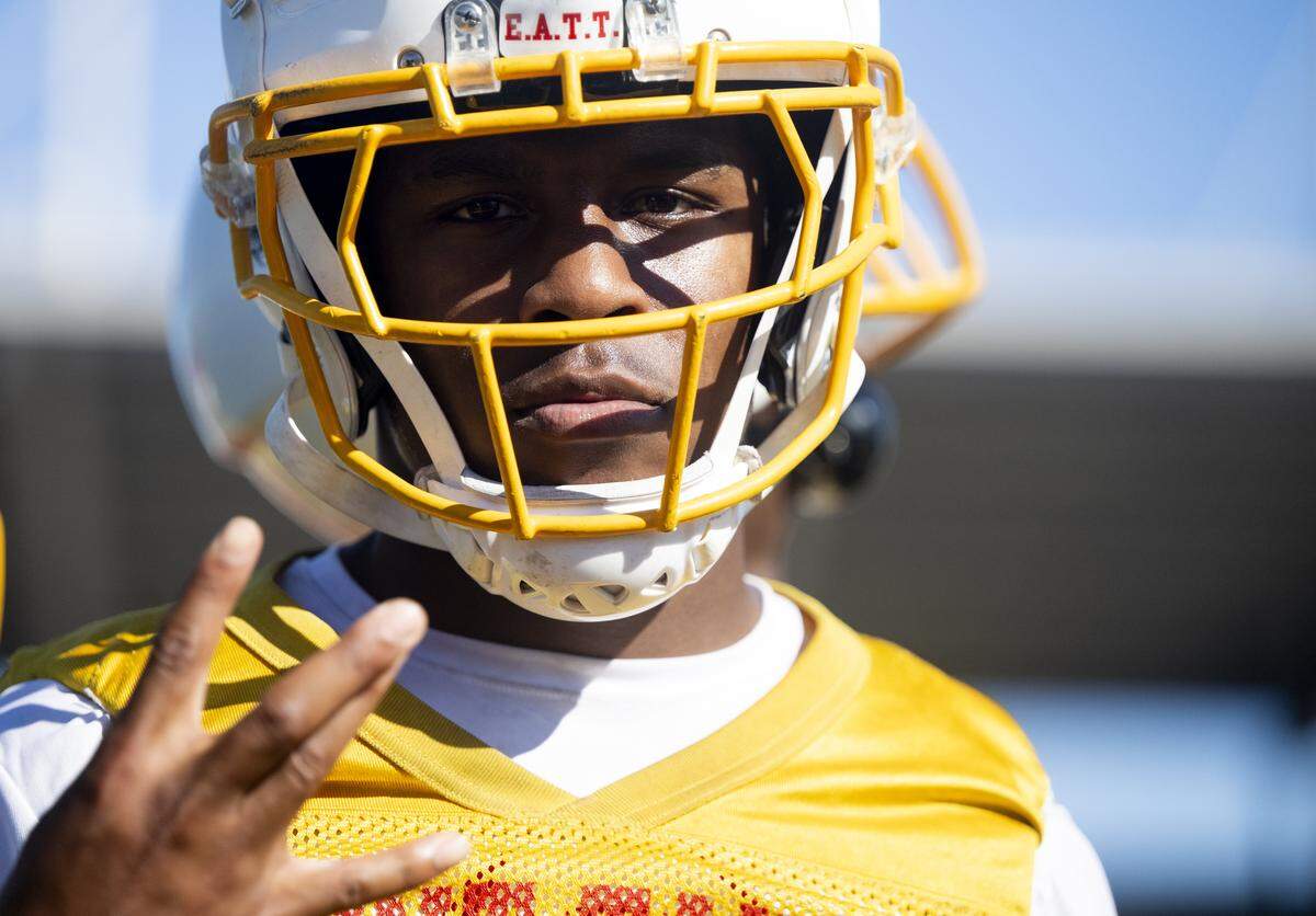 Mount Tahoma wide receiver and cornerback Elijah Durr throws up the dub during a football practice at Mount Tahoma High School on Wednesday, Aug. 20, 2025, in Tacoma, Wash..