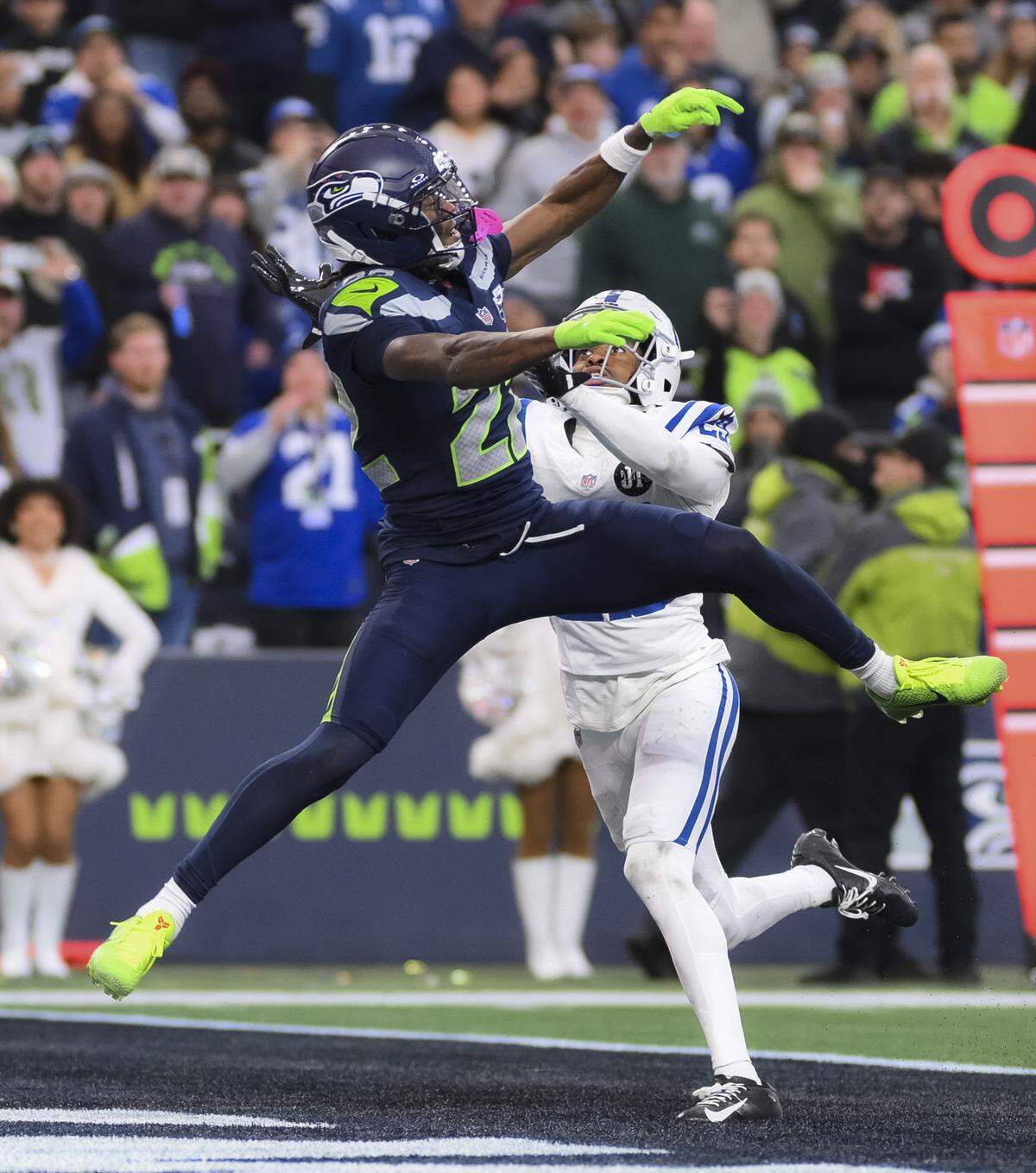 Seattle Seahawks wide receiver Rashid Shaheed (22) is shoved by Indianapolis Colts cornerback Mekhi Blackmon (29) while going up for the ball during the fourth quarter for the of the game at Lumen Field, on Sunday, Dec. 14, 2025, in Seattle.