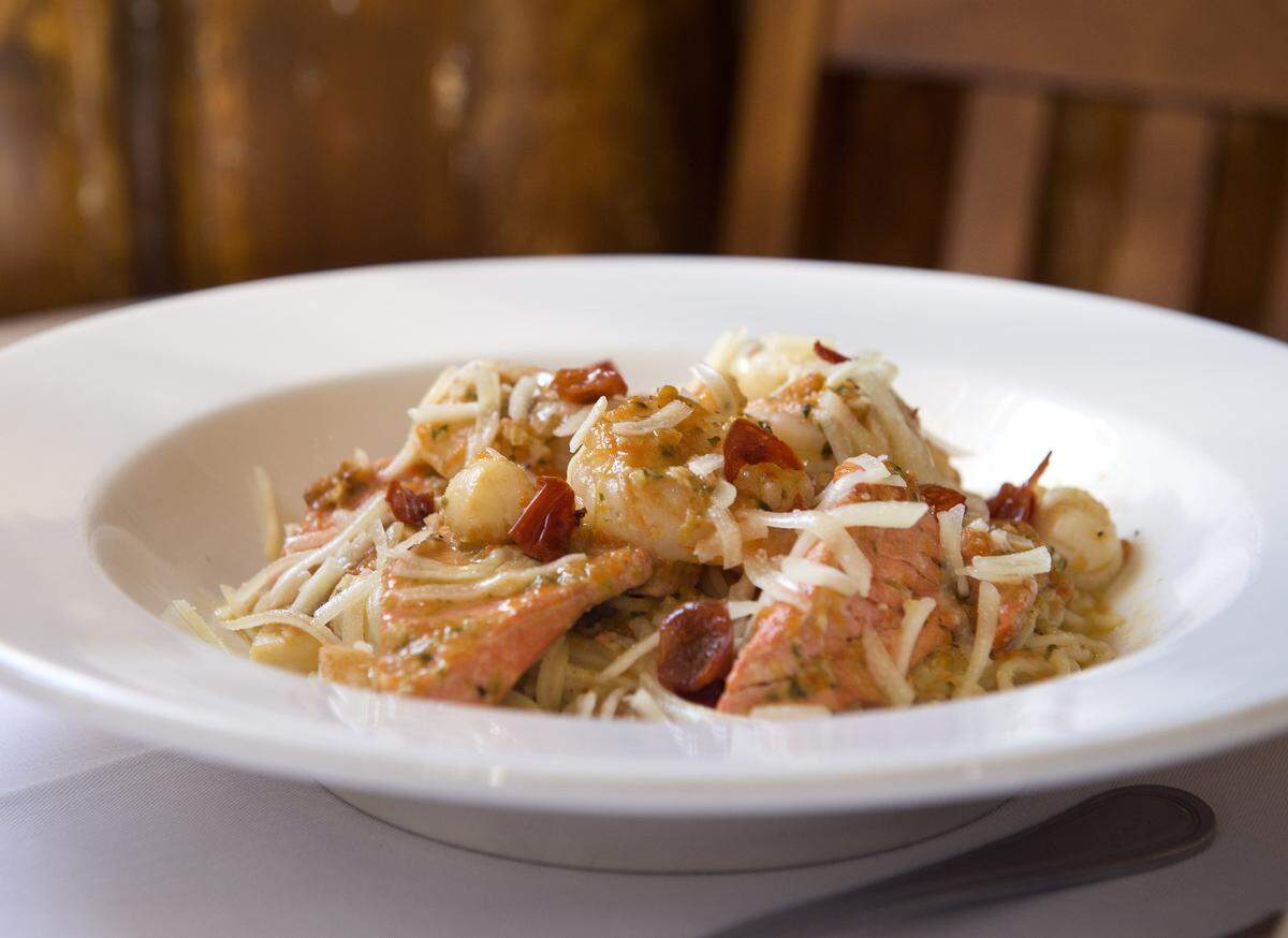 A plate of seafood pasta with shrimp, salmon and scallops is a delight at JW Restaurant in Gig Harbor.