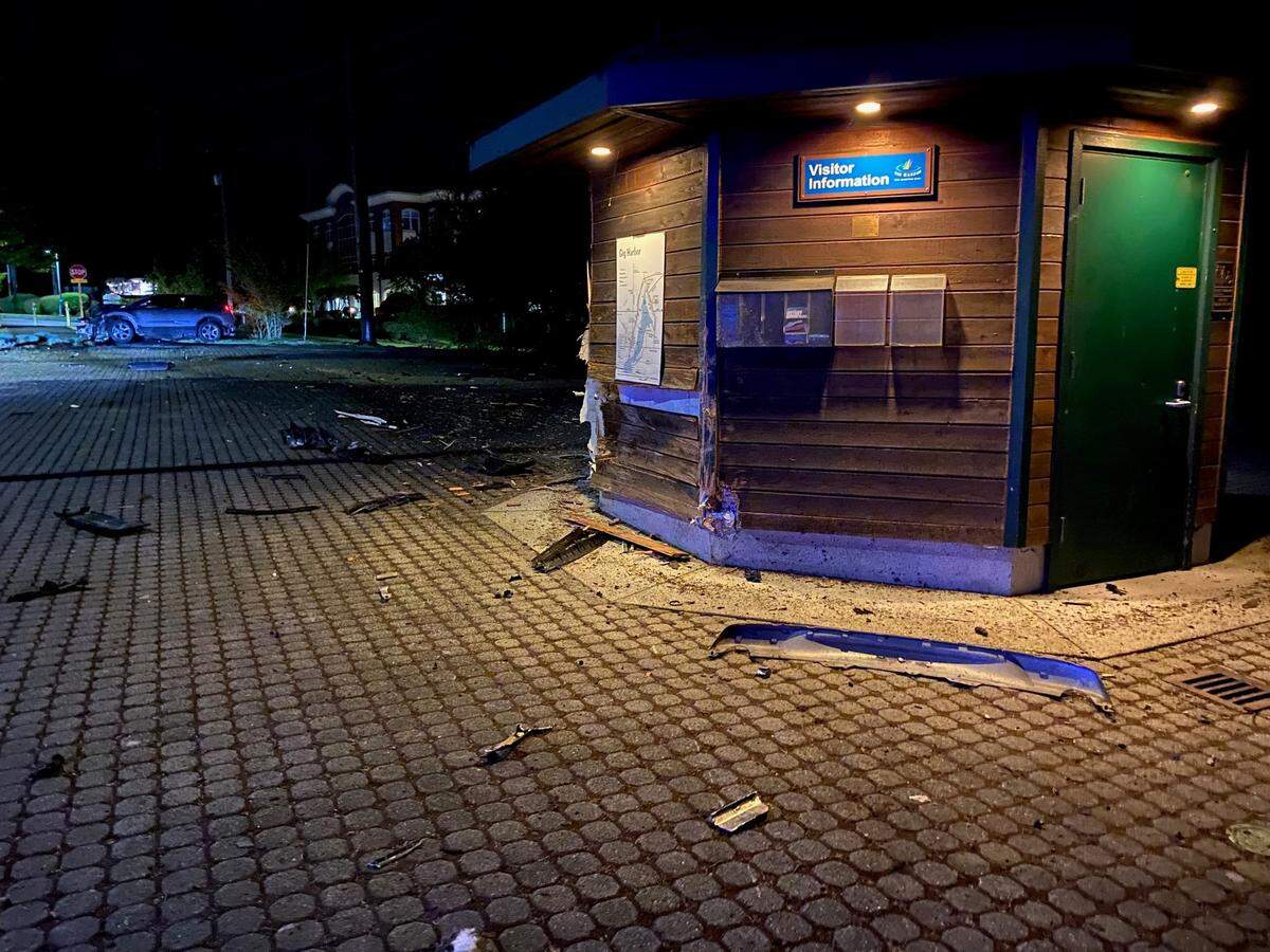 A woman faces charges after she lost control of her car and crashed into a Gig Harbor restroom building on Tuesday.
