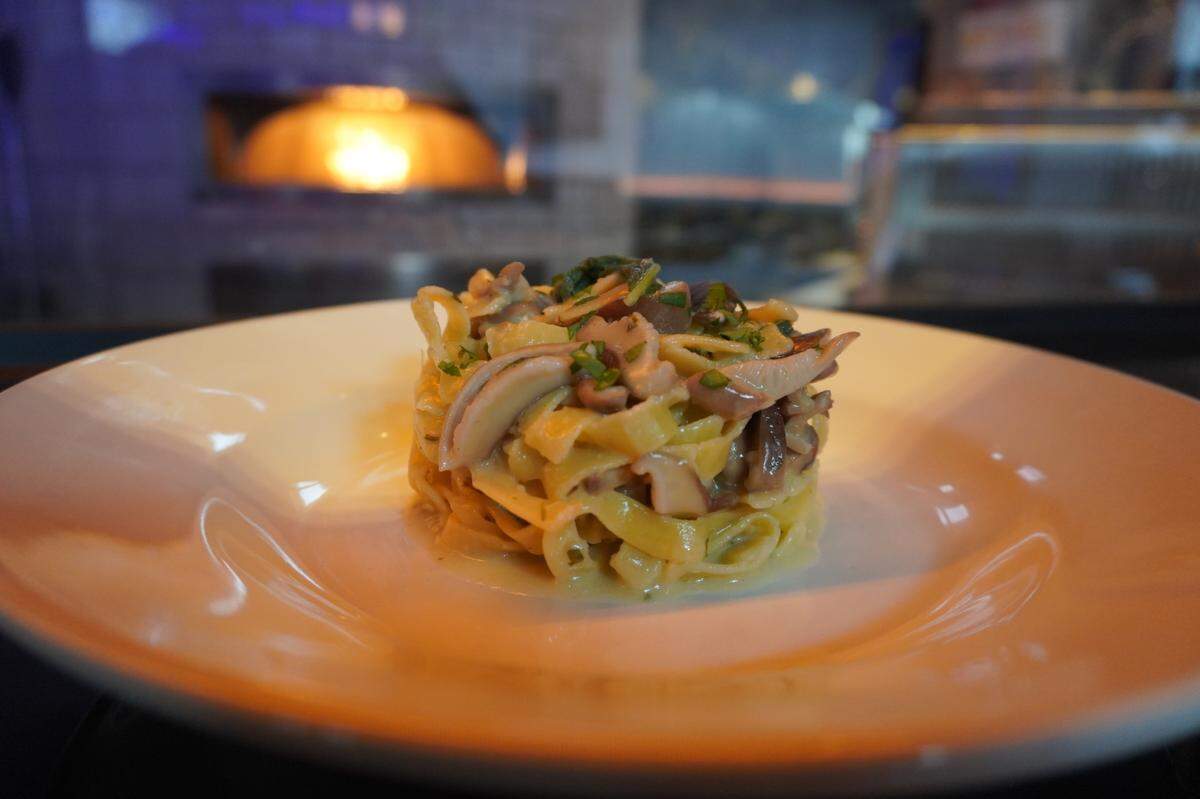 Manuscript executive chef Brandon Barrios learned how to make the Pasta di Paola (tagliatelle with porcini mushrooms, garlic, butter and sage) from an Italian cooking teacher, after whom the dish is named. He also perfected a pomodoro recipe while working in a restaurant outside Naples for several weeks last fall.