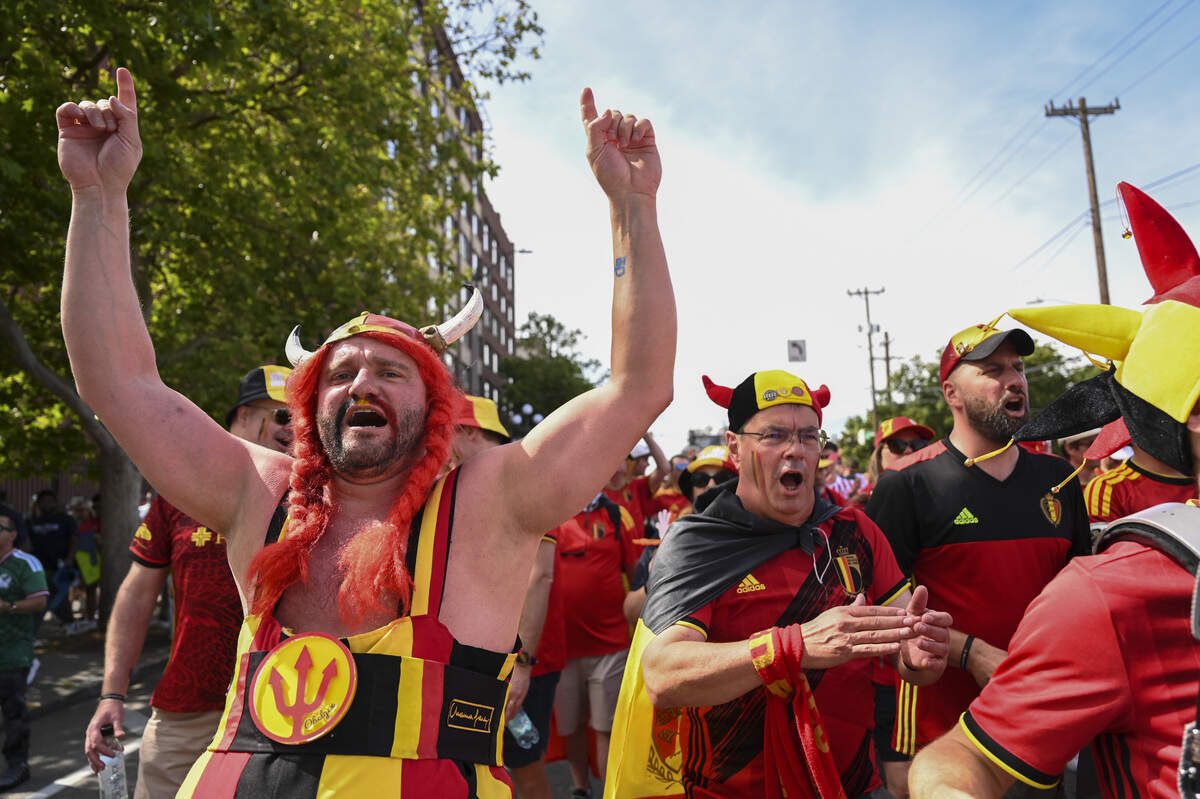 Fans of the “Red Devils,” take part in a fan march to the stadium ahead of Belgium’s opening World Cup match against Egypt on Monday, June 15, 2026, at Lumen Field, renamed “Seattle Stadium,” in Seattle, Wash.