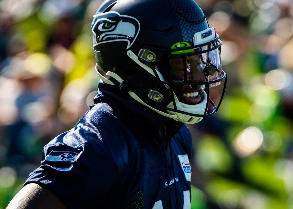DK Metcalf smiles while doing kick return drills at the Seattle Seahawks training camp at the Virginia Mason Athletic Center in Renton, Wash., on Thursday, July 25, 2019.