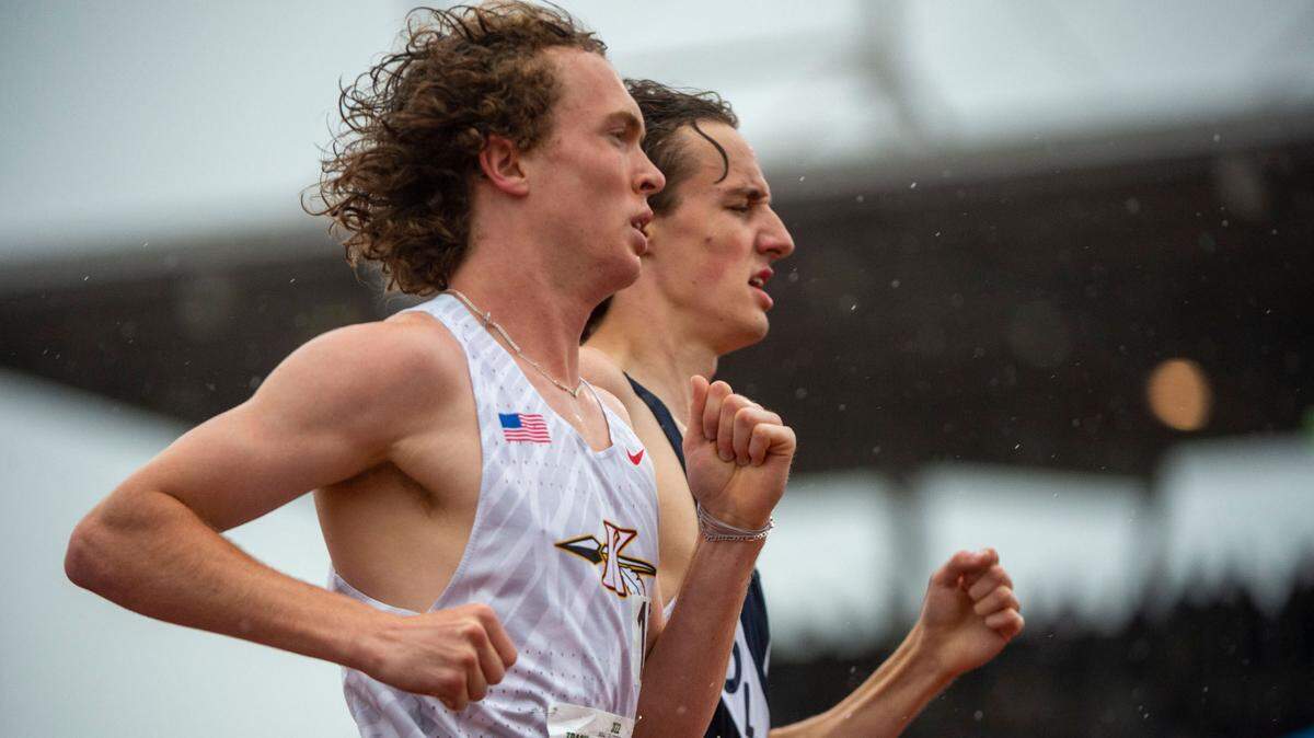 Kennewick’s Isaac Teeples (left) and Olympia’s Ethan Coleman run neck-and-neck after the second lap at the State 2A, 3A, 4A track and field championships at Mount Tahoma High School in Tacoma.