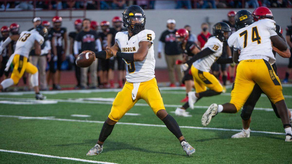 Lincoln quarterback Gabarri Johnson passes. during a game between the Tornados and the Abes in Yelm on Friday, Sept. 3, 2021.