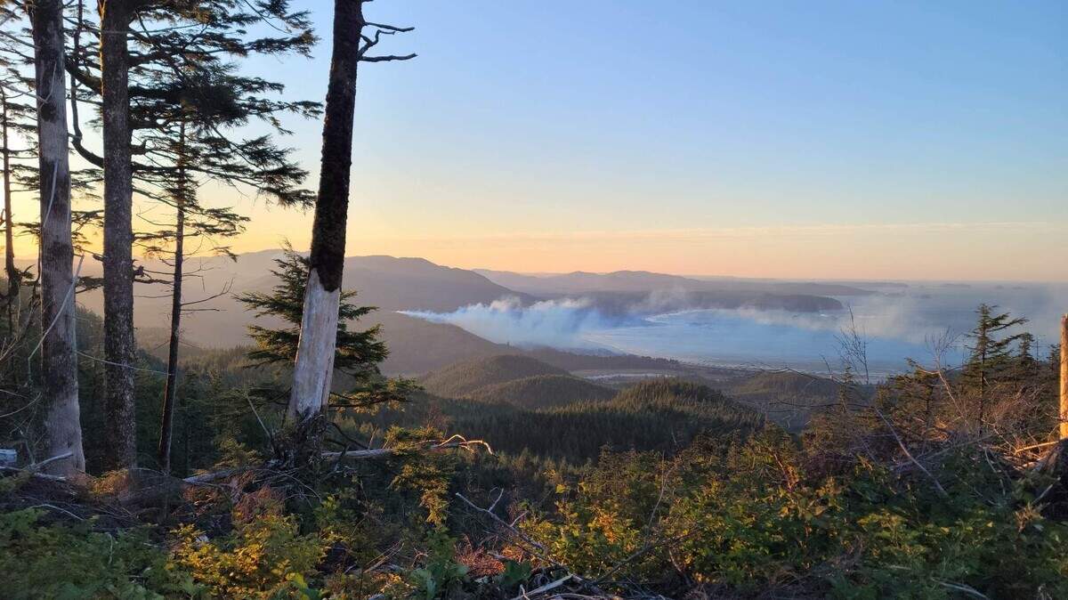 Smoke rises from the Hobuck Fire on Thursday near Neah Bay on the Olympic Peninsula. Dry weather and winds drove an uncommon amount of fires for this time of year this week in Western Washington.
