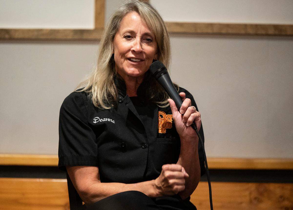 Harris-Bender speaking at a TNT Diner event in 2022. The challenges of the pandemic and considerations for retirement led her to pursue a sale, but she’ll always remember her nearly 25 years building Over the Moon fondly: “When people get what you’re trying to do, it’s an amazing kind of feeling,” she said.