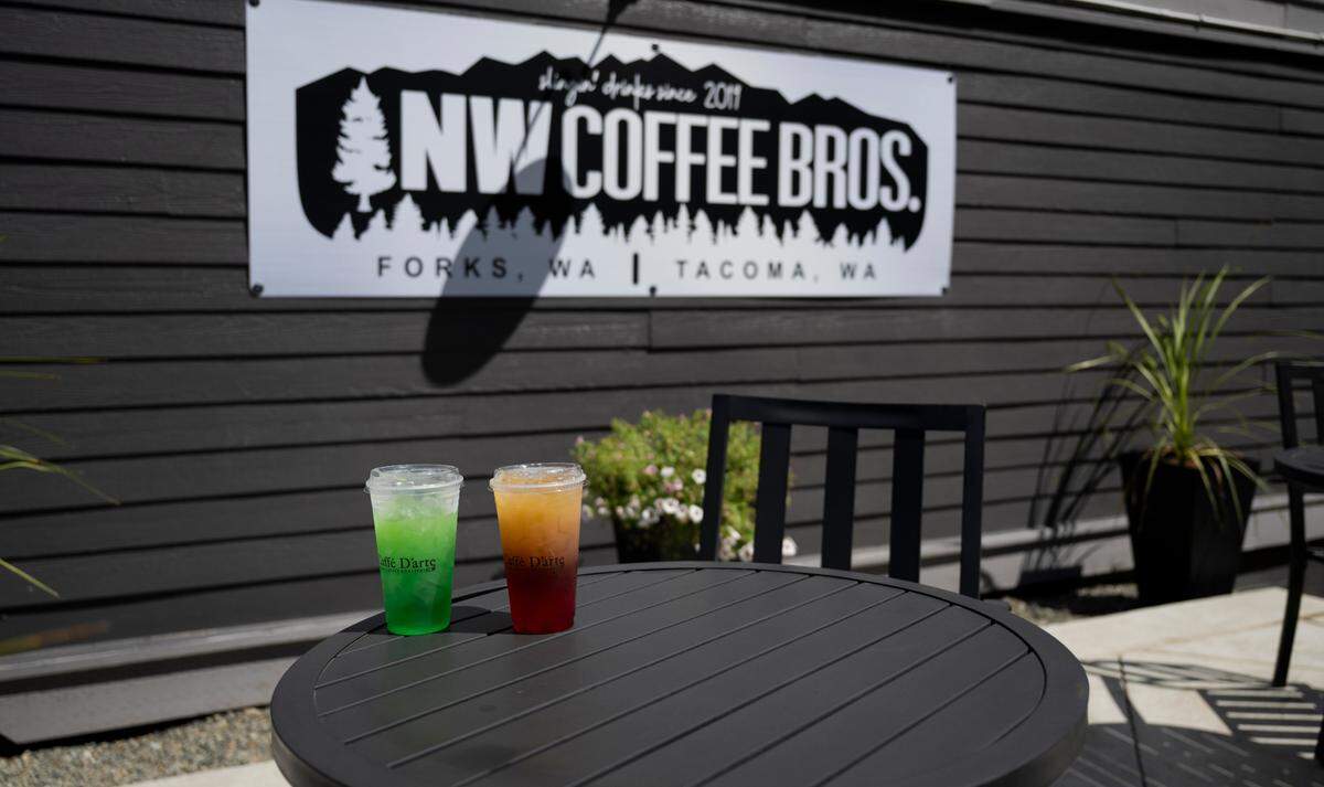 The Mermaid tail, left, and dragonfruit mango Loetus energy drinks on the patio at NW Coffee Bros in Tacoma. The shop brews Caffe d’Arte coffee.