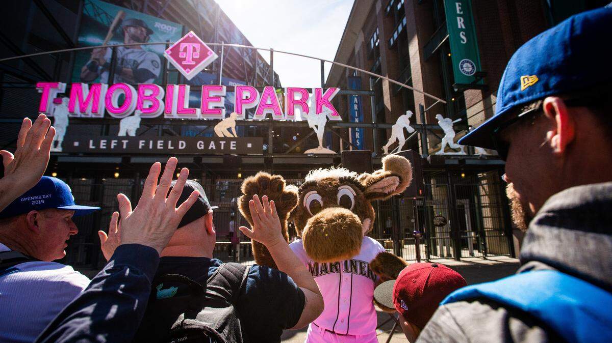 The Mariner Moose high-fives fans outside of T-Mobile Park before the game. The Seattle Mariners played the Boston Red Sox in a Major League Baseball game at T-Mobile Park in Seattle, Wash., on Thursday, March 28, 2019. 