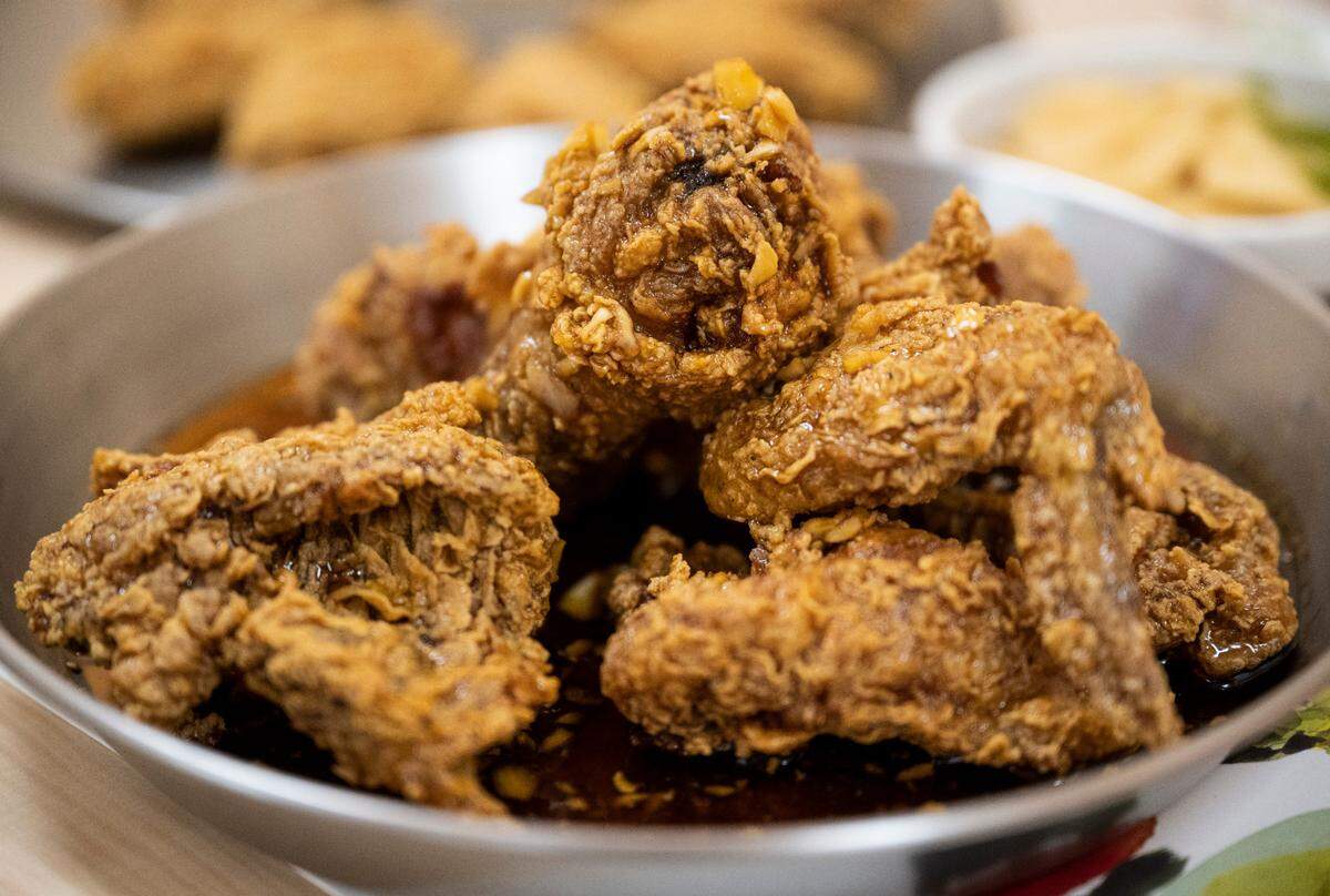 The crunchy, hand-breaded fried chicken also shines at Myungin. Customers commonly order the soy sauce and garlic, but we loved the sweet, spicy and delightfully sticky bird, too.