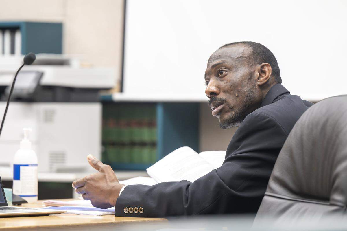 Defendant Jerrmell Rashadd Warren turns to ask a question after going back and forth with Judge Scott Peters for over an hour about the instructions jurors would be given during their deliberations in Warren's trial on Thursday, July 31, 2025, at Pierce Superior Court in Tacoma, Wash. Warren is on trial for fatally shooting Angelina Palmer, 39, in May 2022 outside a 7-Eleven in Spanaway.