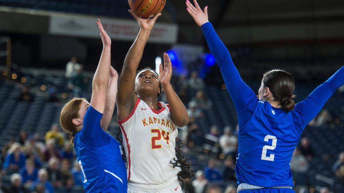 Kamiakin forward Camia Howard (24) puts up a shot in the fourth quarter against Lynnwood in the opening round of the Class 4A girls state basketball tournament on Wednesday, March 1, 2023 at the Tacoma Dome in Tacoma, Wash.