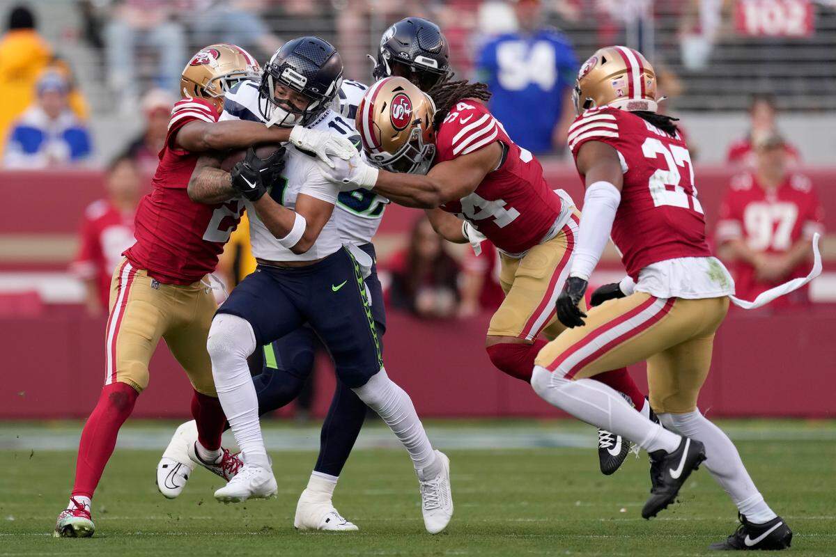 Seattle Seahawks wide receiver Jaxon Smith-Njigba (11) runs against the San Francisco 49ers during the first half of an NFL football game in Santa Clara, Calif., Sunday, Dec. 10, 2023. (AP Photo/Godofredo A. Vásquez)