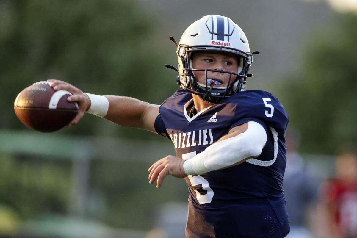 Glacier Peak’s River Lien draws back to pass against Snohomish Friday night at Snohomish High School in Snohomish, Washington on September 2, 2022. Glacier Peak led 28-0 at the half. (Kevin Clark / The Herald)