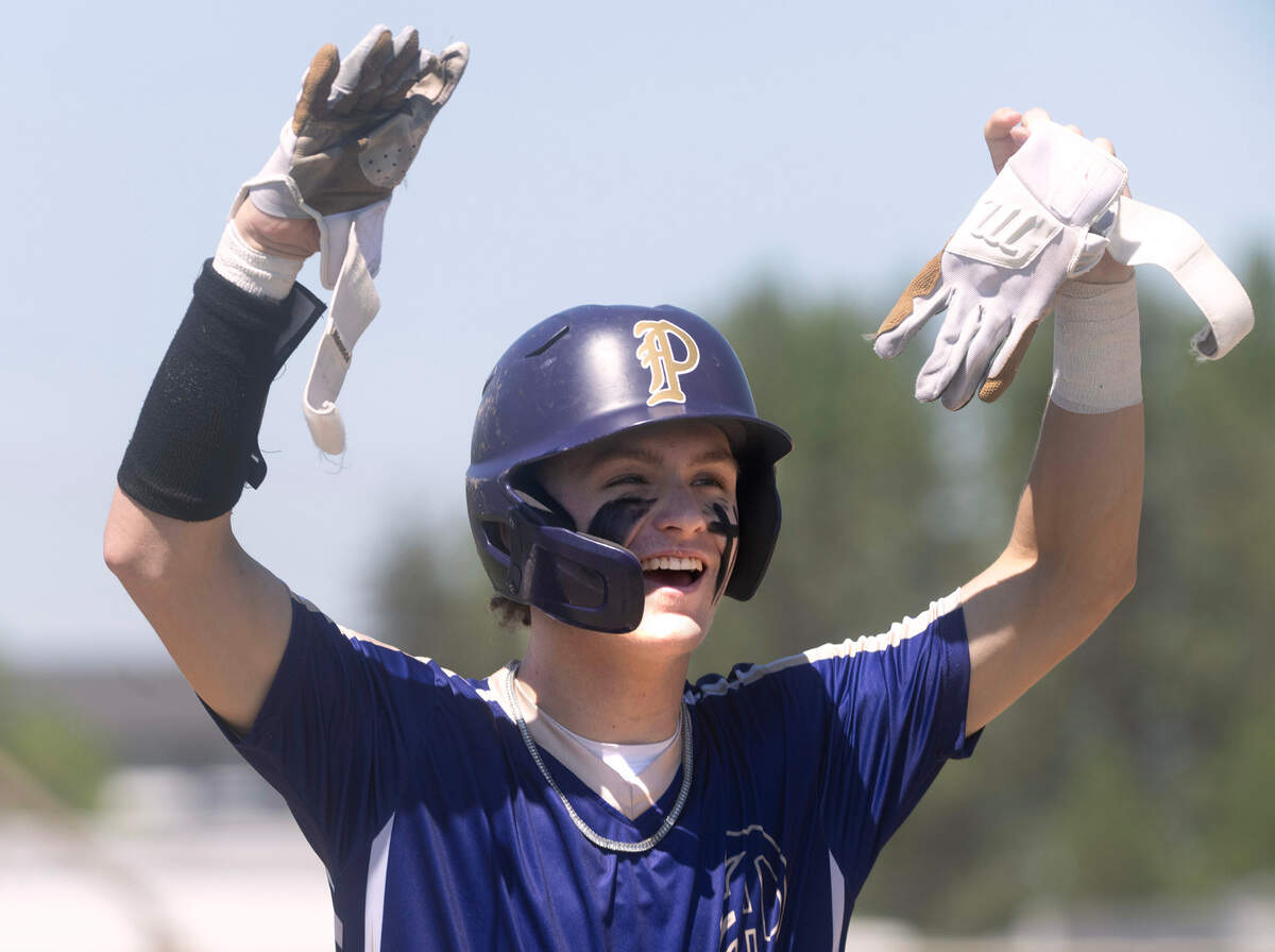 Puyallup’s Max Hemenway celebrates an RBI single during the 4A District 3/4 baseball semifinal game against the Camas Papermakers at Art Wright Field in Kent, Washington,l on Saturday, May 11, 2024.