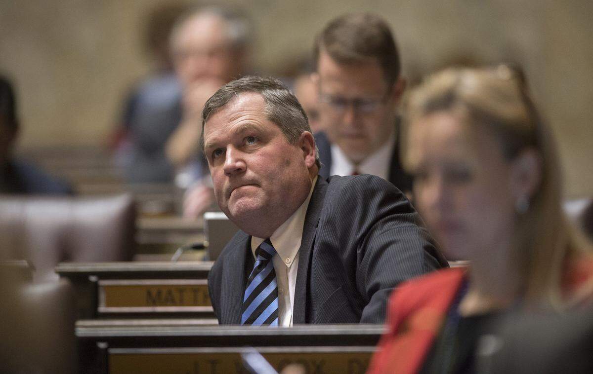 Rep. J.T. Wilcox (R-Yelm) watches voting on the House floor in 2016.