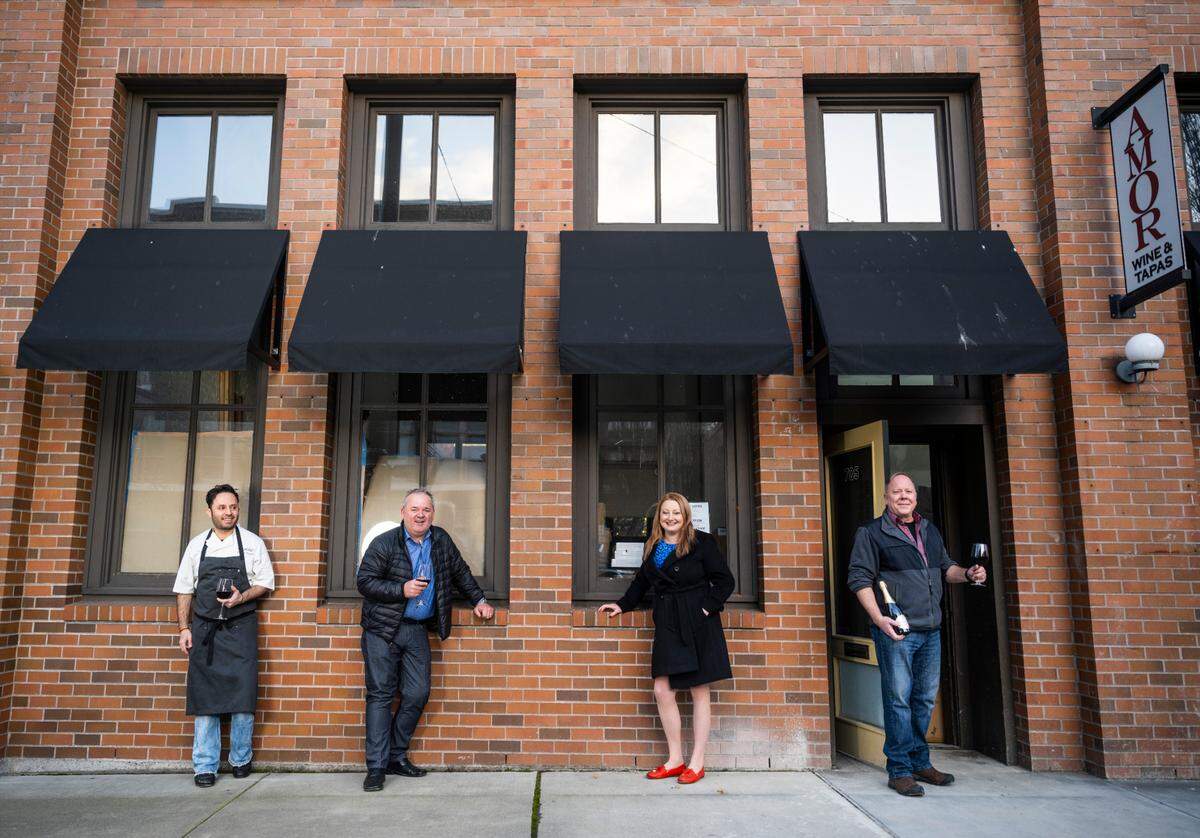 Chef Enrique Vargas, left, brings 20 years of experience cooking cuisines including French, Italian, Spanish and Moroccan. Chris and Elizabeth Dasef, center, have also tapped sommelier Randall Reader, right, to head up the beverage program at Amor Wine & Tapas.