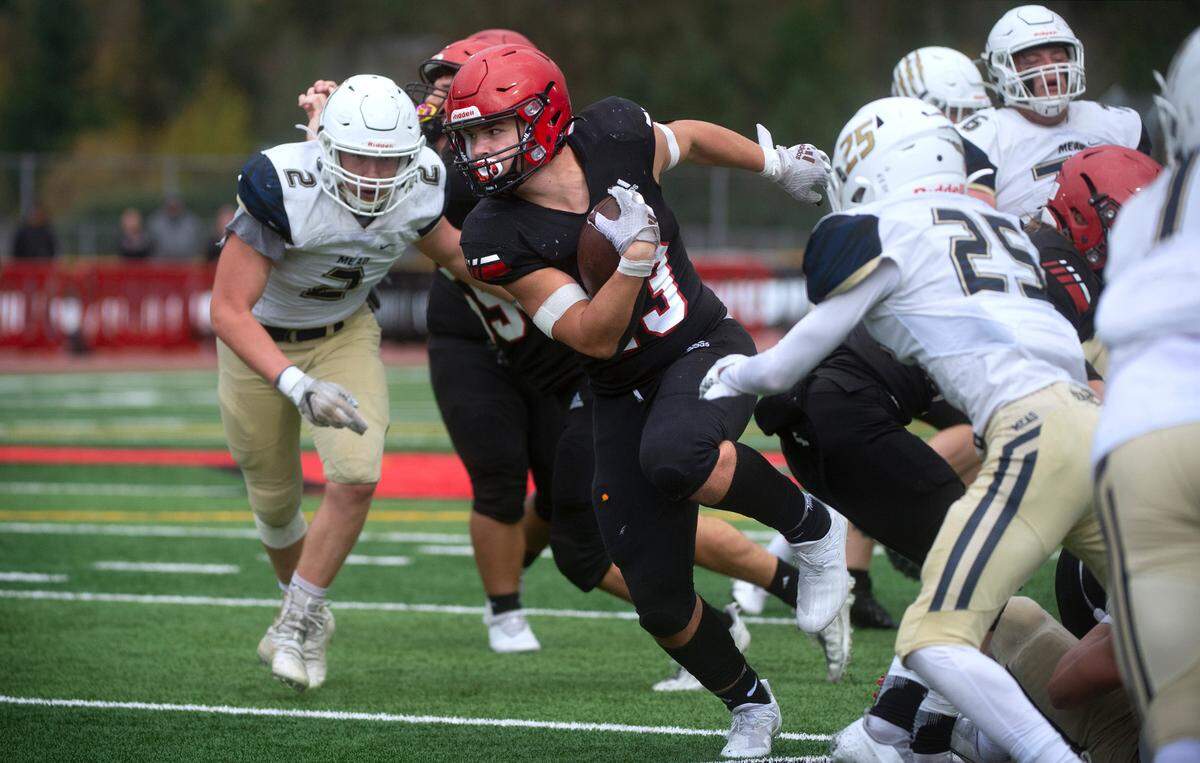 Yelm running back Brayden Platt breaks loose from the Mead defense during Saturday afternoon’s high school football playoff game at Yelm High School in Yelm, Washington, on Nov. 6, 2021. Yelm won the game, 37-21.