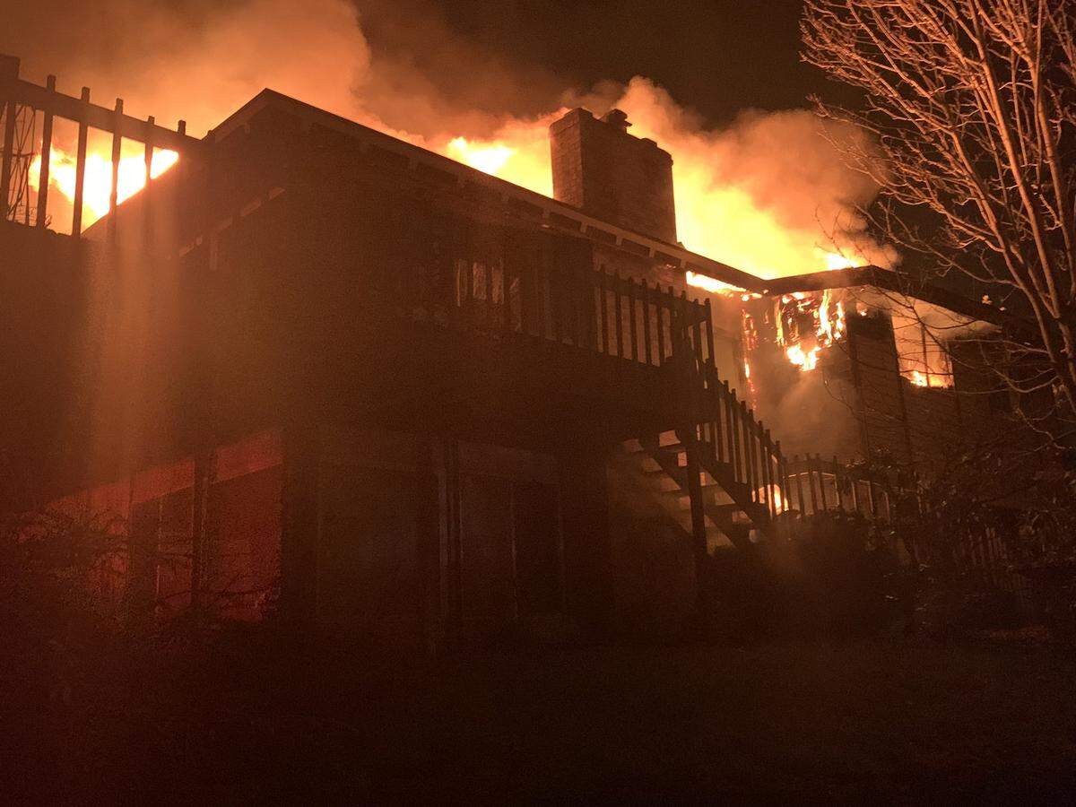 Crews from Tacoma Fire Department battled eight fires Tuesday night and early Wednesday morning, including this fire at a single-family home in the 4600 block of North Gove Street. Police said the fires are being investigated as arson. 
