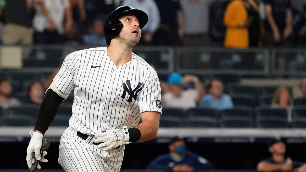 New York Yankees’ Joey Gallo watches his three-run home run during the seventh inning of the team’s baseball game against the Seattle Mariners, Thursday, Aug. 5, 2021, in New York. (AP Photo/Mary Altaffer)