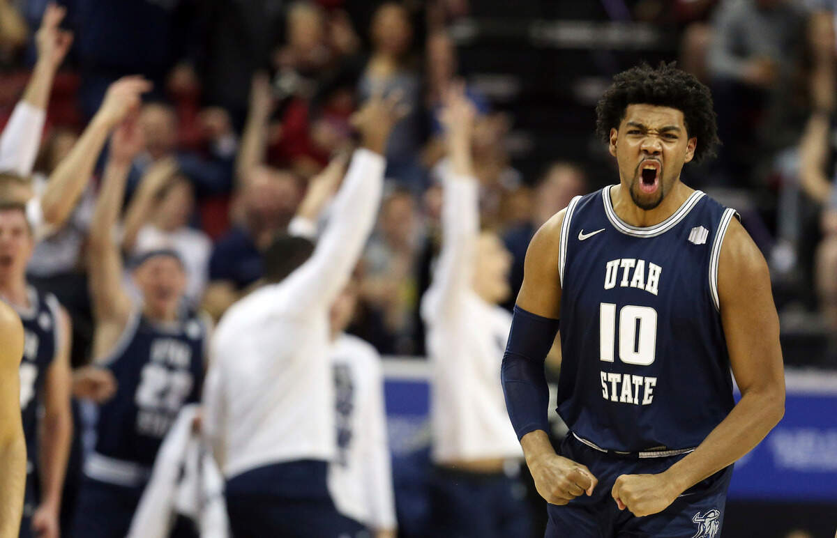 Utah State’s Alphonso Anderson (10) reacts after sinking a 3-point shot during the second half of an NCAA college basketball game for the Mountain West Conference men’s tournament championship Saturday, March 7, 2020, in Las Vegas. (AP Photo/Isaac Brekken)