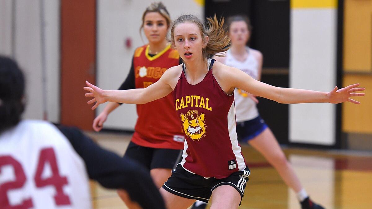 Cougars’ Sydney Riedel sets up during defensive drills during Capital’s Jan. 20th morning practice