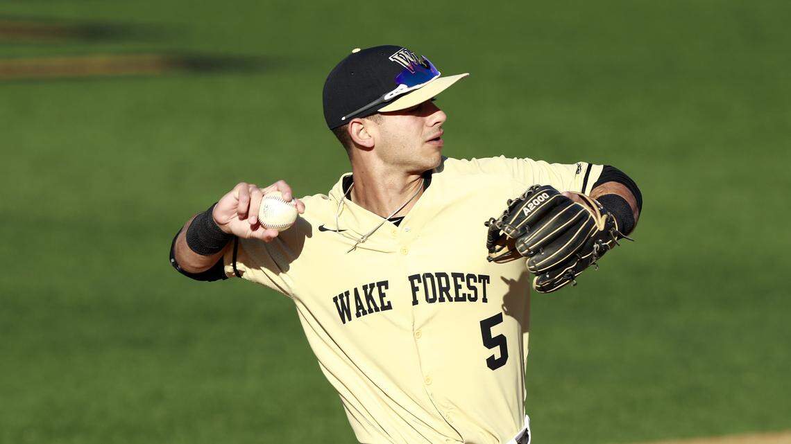 Wake Forest infielder Patrick Frick throws against Liberty during an NCAA baseball game on Tuesday, April 16, 2019 in Winston-Salem, N.C.