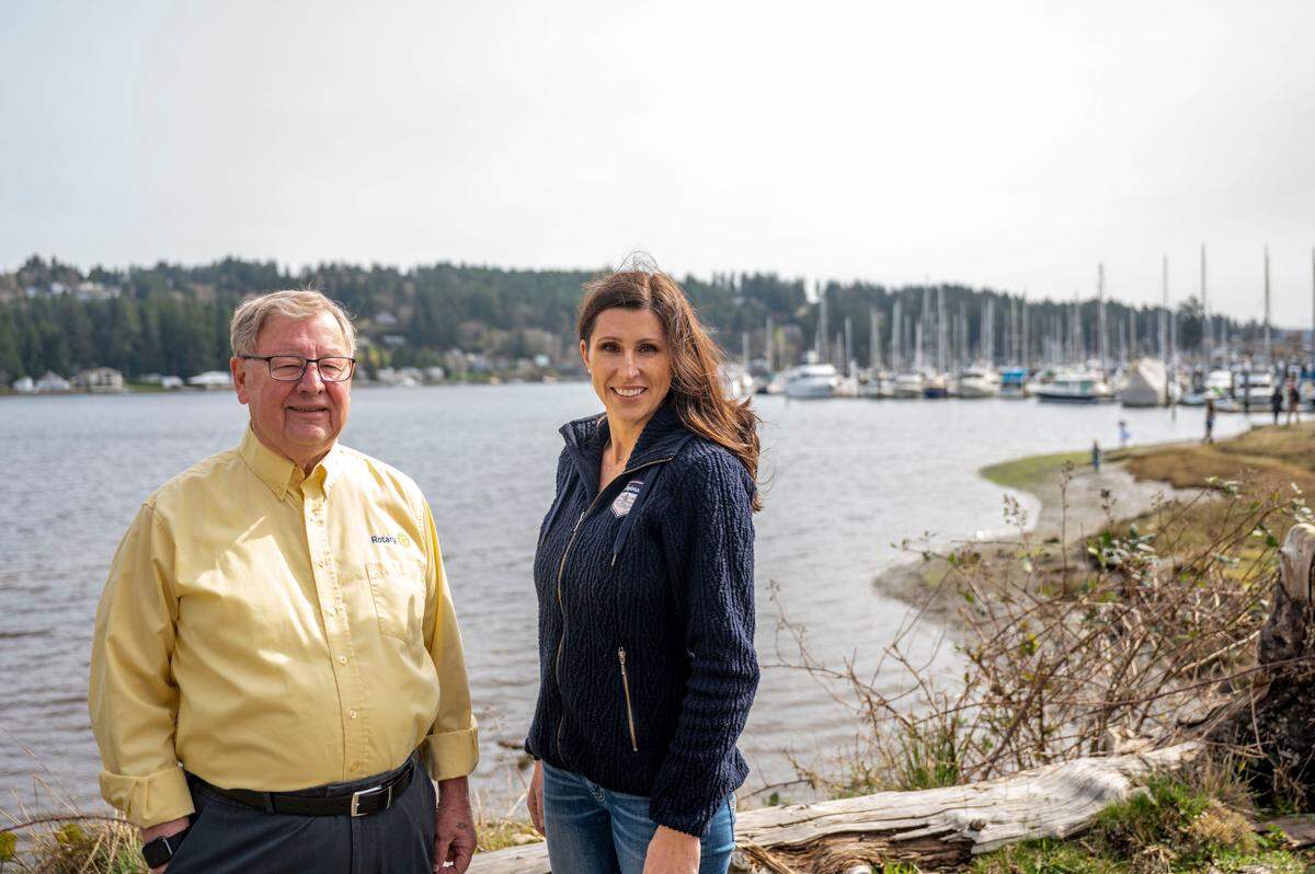 Former Rotary President, Bob Anderson (left) and Natalie Wimberley vice president of the Peninsula School Board, pose for a portrait in Gig Harbor, Wash., on Thursday, March 24, 2022.