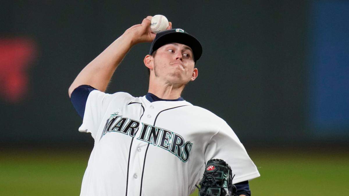 Seattle Mariners starting pitcher Chris Flexen in action against the Texas Rangers in a baseball game, Thursday, May 27, 2021, in Seattle. (AP Photo/Elaine Thompson)