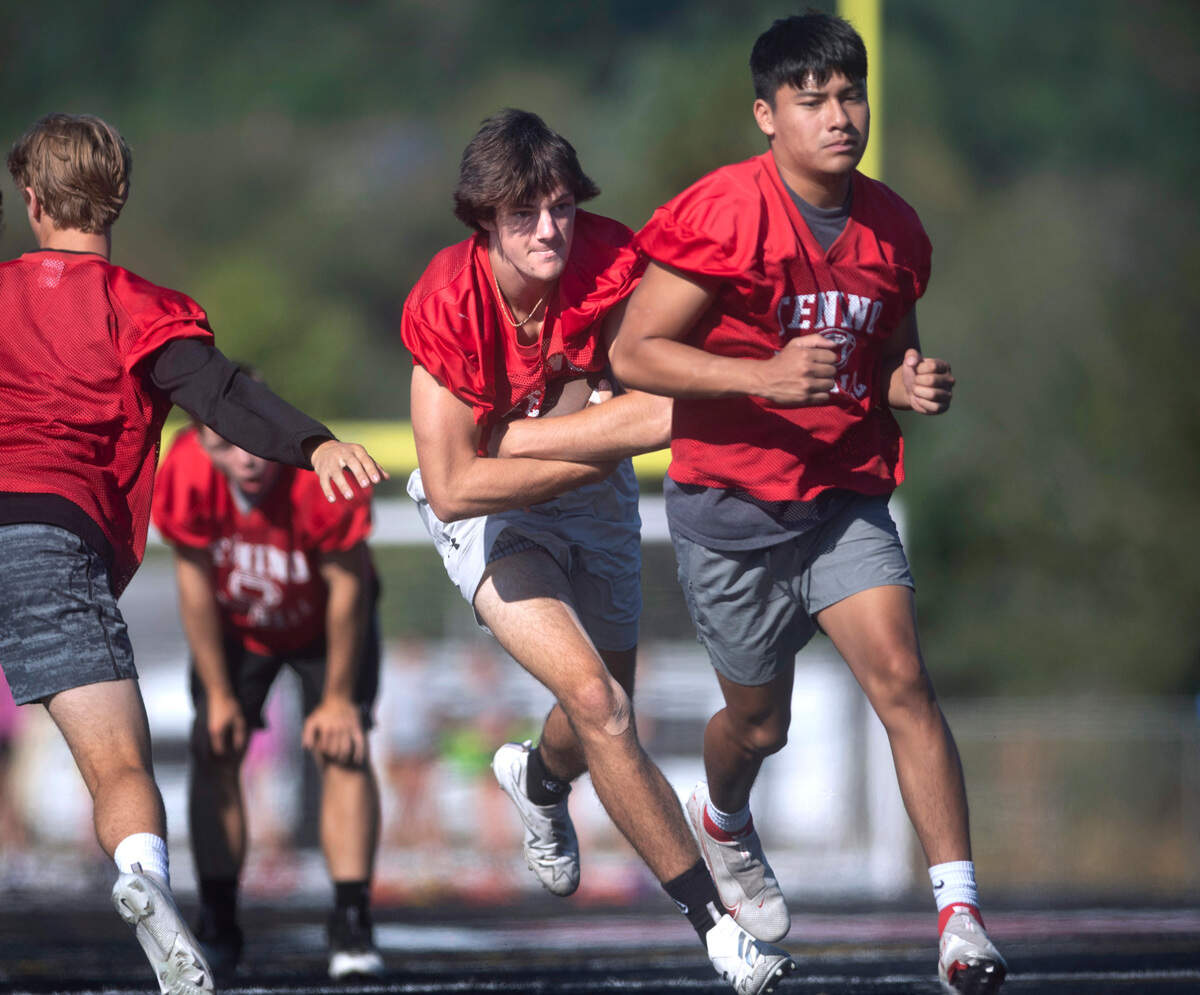 Tenino senior running back Dylan Spicer runs through drills during football practice at Tenino Beaver Stadium in Tenino, Washington on Thursday, Aug. 25, 2022.