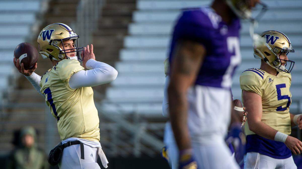 Washington quarterback Sam Huard attempts a pass during spring practice on Friday, April 8, 2022, at Husky Stadium in Seattle.
