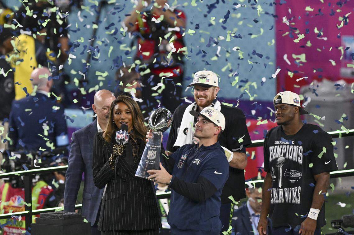 Seattle Seahawks head coach Mike Macdonald lifts the Lombardi Trophy after the Seahawks win Super Bowl LX at Levi’s Stadium in Santa Clara on Sunday, Feb. 8, 2026.