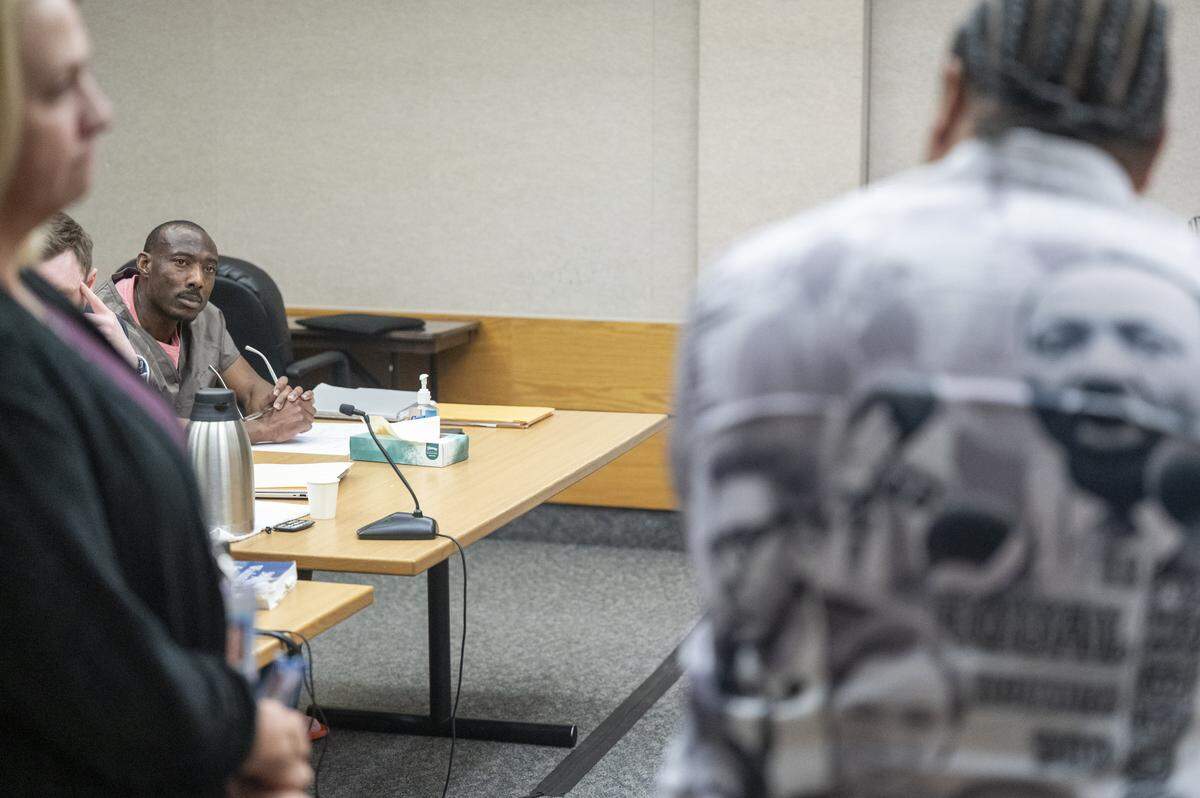 Willard Palmer, right, the brother of Angelina Palmer, turns to face Jerrmell Warren as he gives a victim impact statement at the Warren's sentencing on Friday, Oct. 17, 2025, at Pierce County Superior Court in Tacoma, Wash. Warren was convicted for by a jury in August of felony murder for killing 39-year-old Angelina Palmer outside a Spanaway gas station in May 2022.