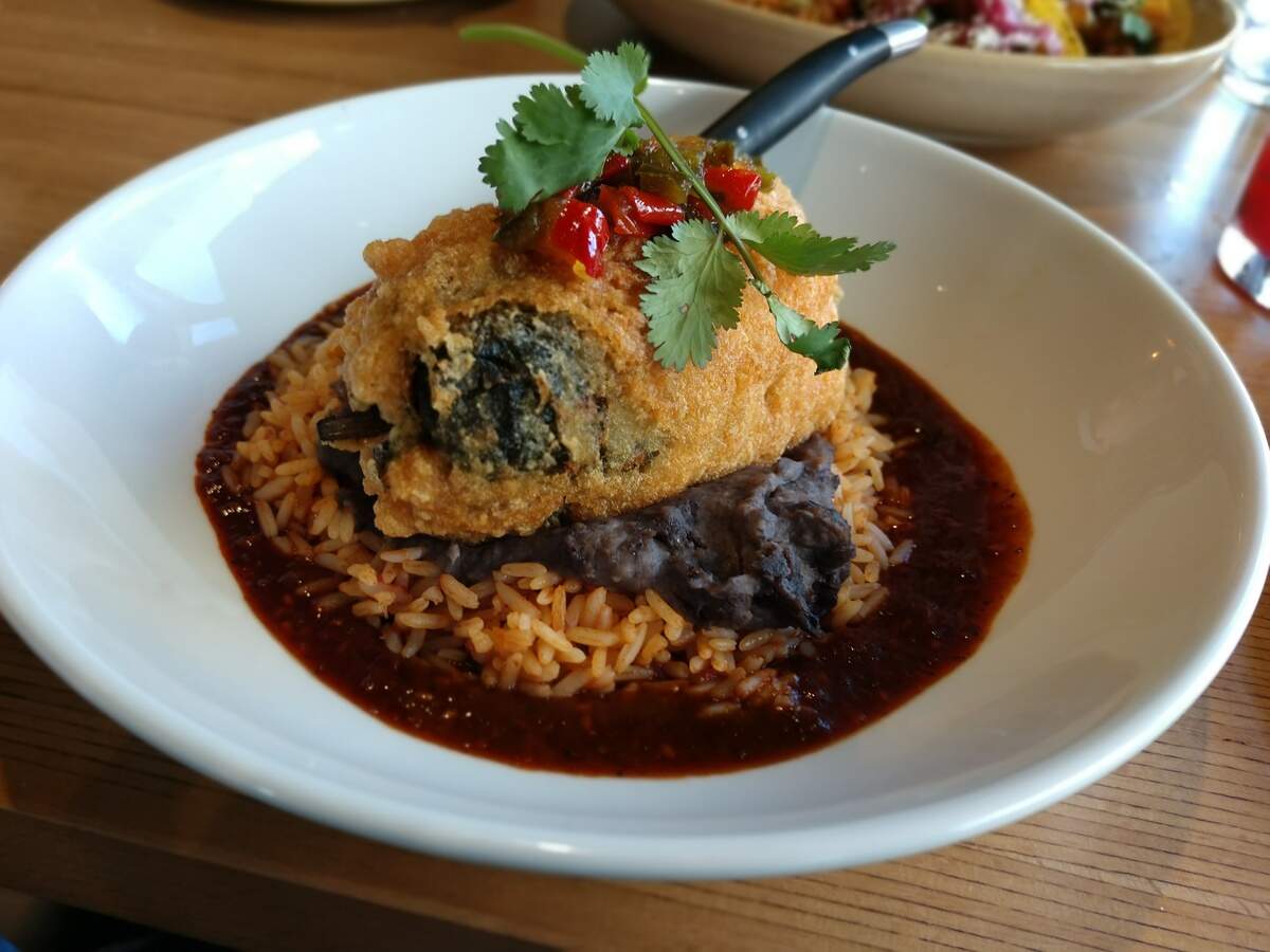 A poblano relleno filled with goat cheese from Cactus Southwestern Kitchen + Bar in Tacoma’s Proctor neighborhood.