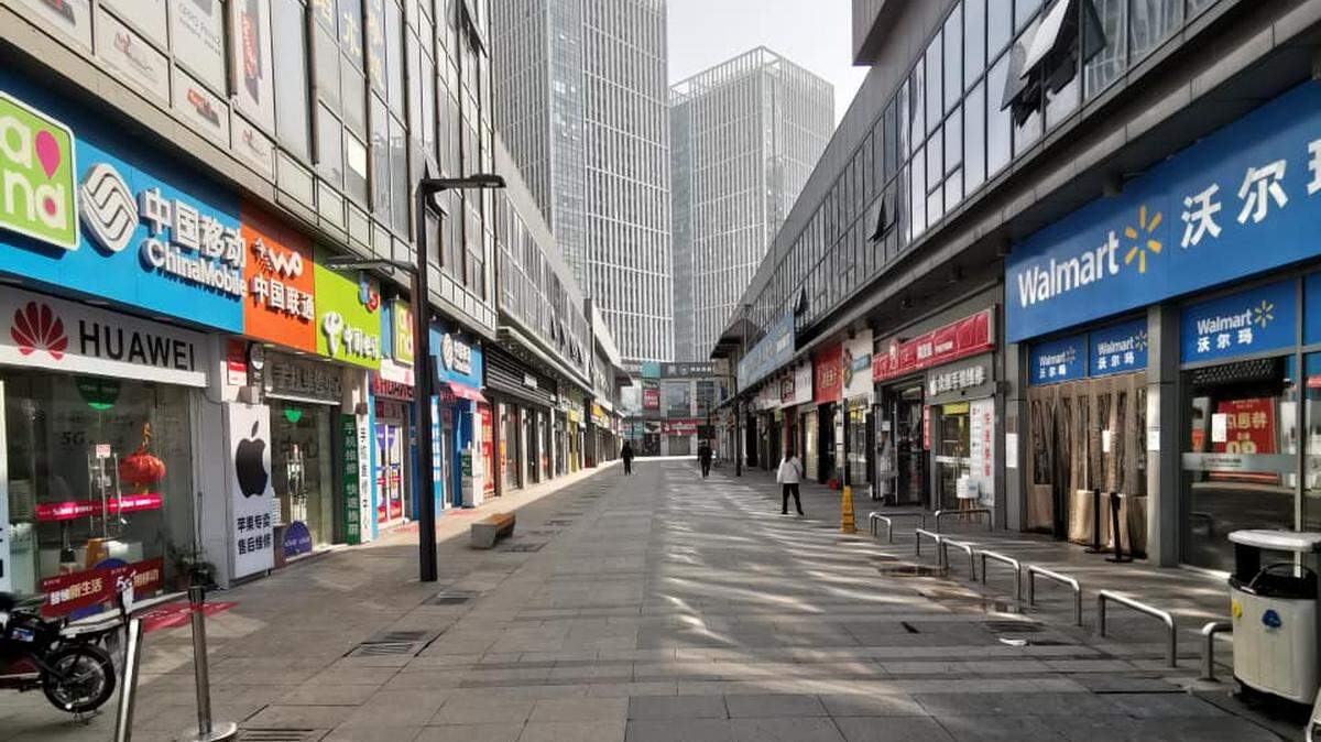 A near-empty walkway among shops in Wuhan, China, in January 2020.