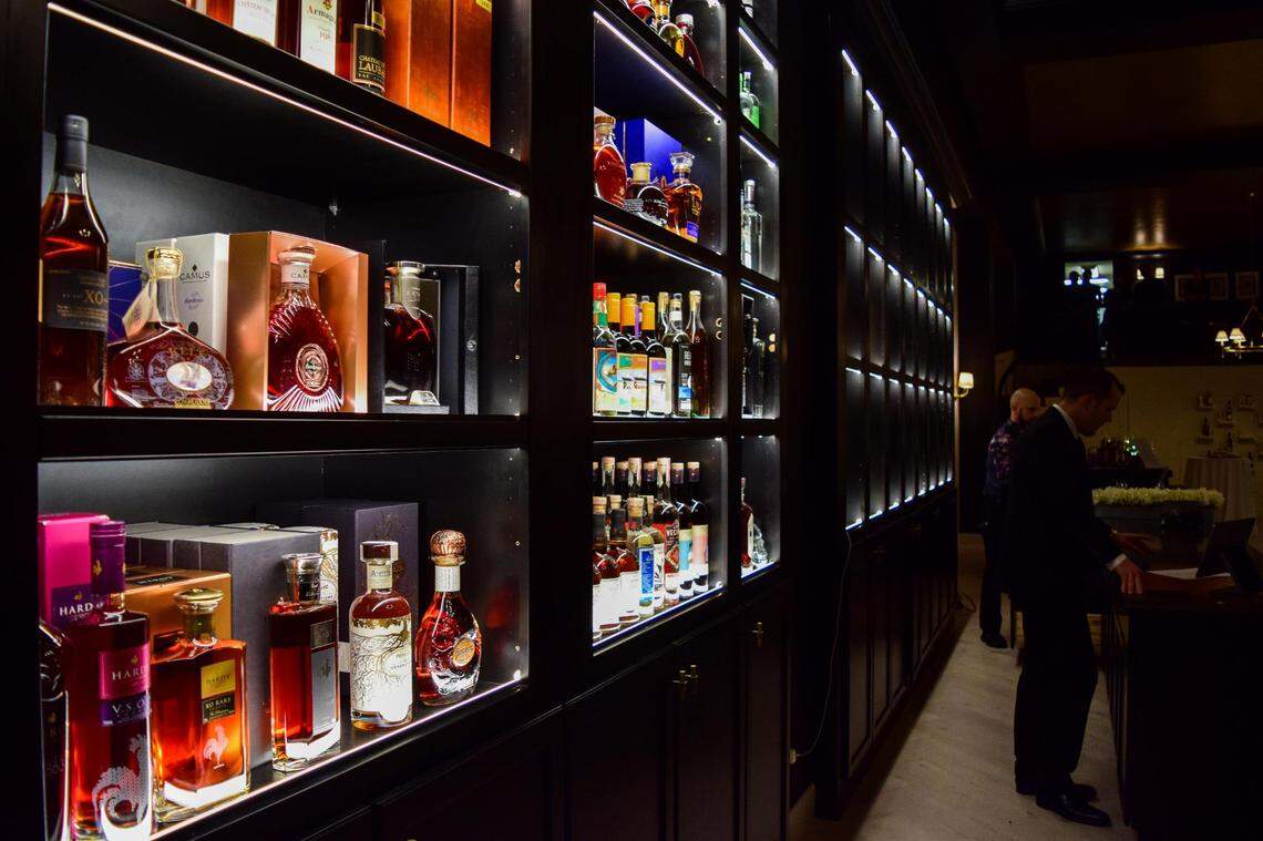 McCallum & Sons Whisky, a boutique spirits store in downtown Tacoma, Washington, opened in December 2021 at 1115 A St. Owner Glen McCallum stands at the counter on Saturday, Dec. 14.
